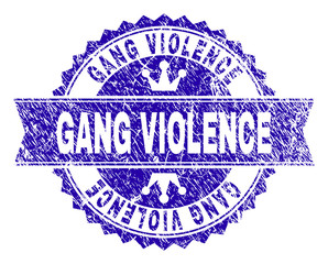 GANG VIOLENCE rosette stamp seal imitation with grunge style. Designed with round rosette, ribbon and small crowns. Blue vector rubber watermark of GANG VIOLENCE title with unclean style.