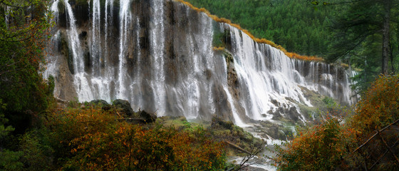 The panoramic colorful scenery of waterfall at Jiuzhaigou national park, world heritage site located in Sichuan Province China
