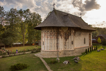 Obraz premium Gura Humorului,Romania - Moldavian medieval Monastery of Humor, up view of the church. Moldavia's painted monasteries.october, 2017