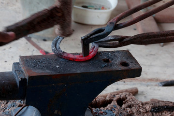 Farrier making horseshoe by Ancient style
