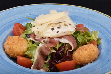 salad with tomatoes, smoked ham,cheese and mayonnaise