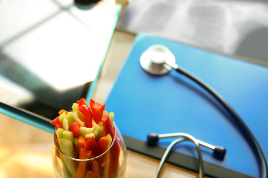  stethoscope, vegetable and x-ray in the office