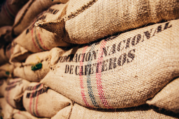 Sacks of colombian coffee ready for export hessian bags