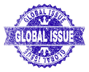 GLOBAL ISSUE rosette stamp watermark with distress style. Designed with round rosette, ribbon and small crowns. Blue vector rubber print of GLOBAL ISSUE tag with unclean style.