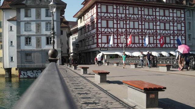 Lucerne, Switzerland view and its medieval architecture. Reuss River in Altstadt (Old Town) with Kapellbr&uuml;cke (Chapel Bridge) and surrounded by Alps mountains on Lake Lucerne.