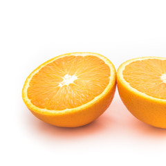 Ripe orange isolated on white background - fresh citrus fruit photography, orange cut in half