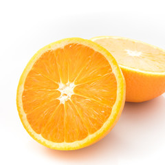 Ripe orange isolated on white background - fresh citrus fruit photography, orange cut in half