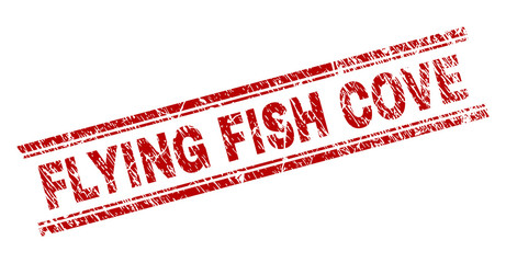FLYING FISH COVE seal print with distress texture. Red vector rubber print of FLYING FISH COVE text with dirty texture. Text label is placed between double parallel lines.