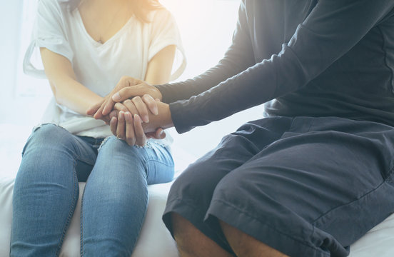 Man giving hand to depressed woman,Suicide prevention,Mental health care concept