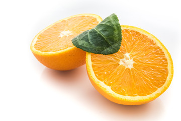 Ripe orange isolated on white background - fresh citrus fruit photography, orange cut in half