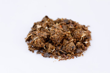 A bunch of perga on a white background. Bee product. Close-up.