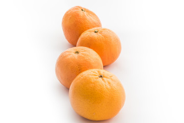Ripe mandarines isolated on a white background