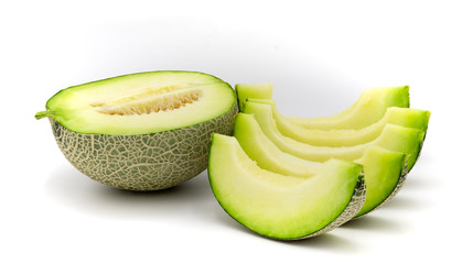 Green melon slices isolated on white background.