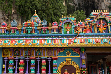 Detail of brightly coloured architecture surrounding the entrance to Temple Cave