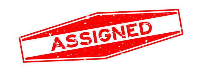 Grunge red assigned word hexagon rubber seal stamp on white background