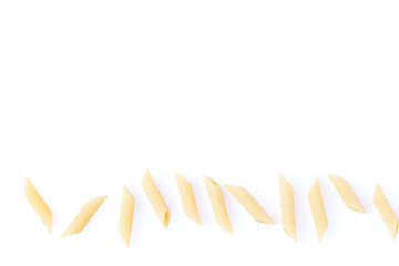 Raw feathers macaroni. Italian pasta close up on the white background