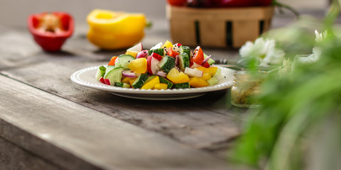 vegetables salad (tomato, cucumber, radish, pepper, arugula, onion, etc.). top, food background copy space