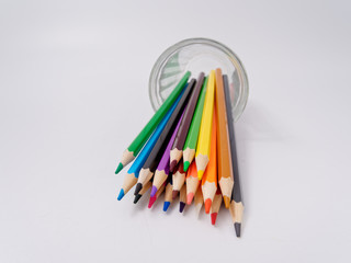 colored pencils sharpened on a white background.