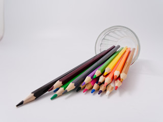 colored pencils sharpened on a white background.