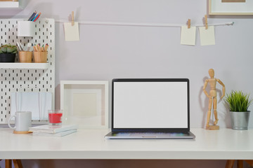 Minimalist stylish workspace isolated screen laptop and copy space