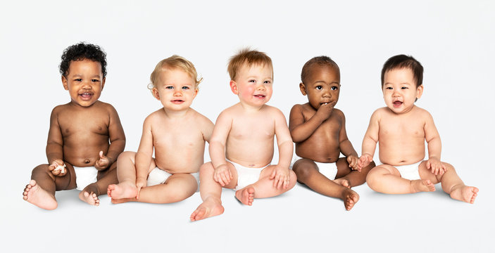 Diverse babies sitting on the floor
