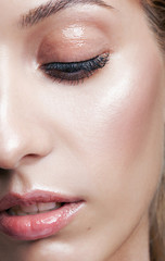Fototapeta premium Closeup macro shot of female face and eyes makeup