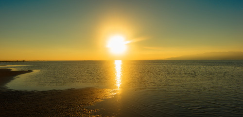 Fototapeta premium Sunset in the ebro delta by the sea