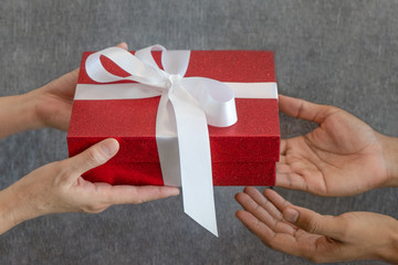 Man holding a gift box for special day