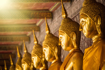 Obraz premium Golden Buddha Statue of Wat Suthat Devaravaram temple landmark of Bangkok, Thailand