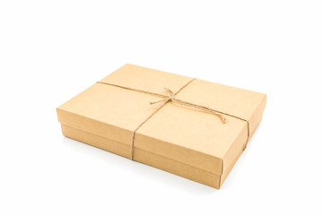 Brown paper box, tied with string.