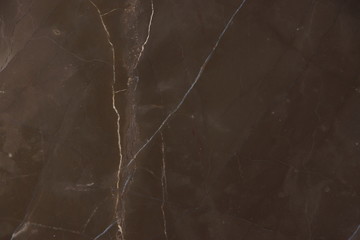 A beautiful background of natural marble stone brown with light stripes, called Graphite Brown