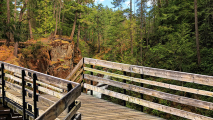 Canadian Rocky Mountains nature landscape and wooden tourist trail (pathway)