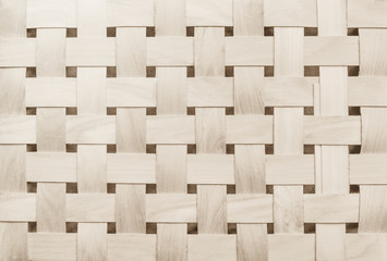 Woven Wooden strips pattern or Wickerwork bamboo texture background.