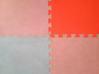 Old Colorful foam or rubber floor and colorful soft board with copy space ,Colorful  puzzles, top view