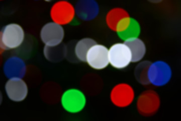 Colorful bokeh out of focus. Christmas lights circles.
