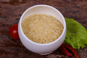 Raw uncooked rice in the bowl