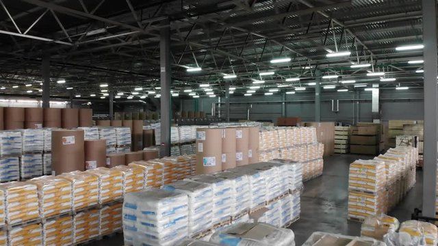 Top view of the interior area in a warehouse pallet racking storage of goods. Aerial, top view.