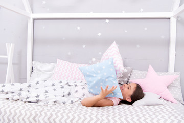 Ways to fall asleep faster. Fall asleep as fast as possible. Fall asleep faster and sleep better. Healthy sleep. Sweet dreams. Girl happy child lay bed pillow and blanket bedroom. Lullaby concept