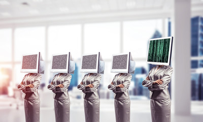 Business women with monitors instead of head.
