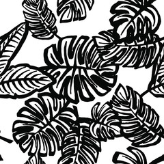 Tropical leaves pattern,seamless print in black and white,in vector.