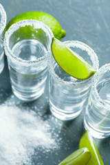 Mexican Tequila in short glasses with lime and salt