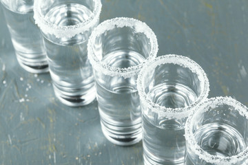 Mexican Tequila in short glasses with lime and salt