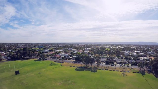 Drone footage of Australian public park and sports oval, taken at Henley Beach, South Australia.