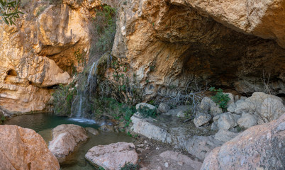 Cave, waterfall, canyon panoramic view with no people