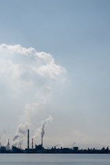 Obraz premium It is a view overlooking Otake industrial area from around Kuga station. You can see the chimney of the factory in the exhaust.