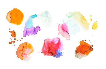 Abstract watercolor yellow, brown, blue, red, purple and pink spills isolated on white