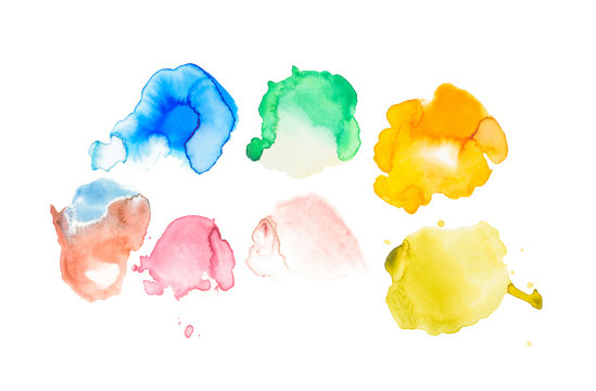 Abstract watercolor yellow, green, blue, coral, golden and purple spills isolated on white