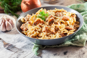 Creamy farfalle pasta with salmon, parmesan cheese and dill