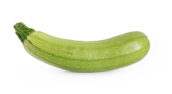 Fresh green zucchini isolated on white background