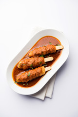 Soya Chaap Curry served in a bowl. Healthy recipe popular in India and Pakistan